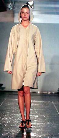 Luciane in tan matte polyurethane shaker raincoat with drawstring hood
