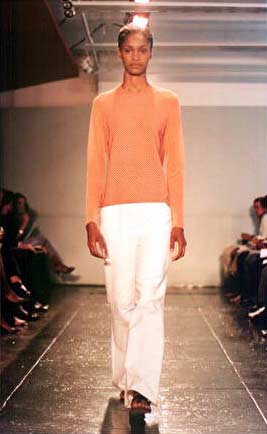 Kimanee in orange/white checker jersey with orange white pindot sleeves and cotton pique v suspension pant